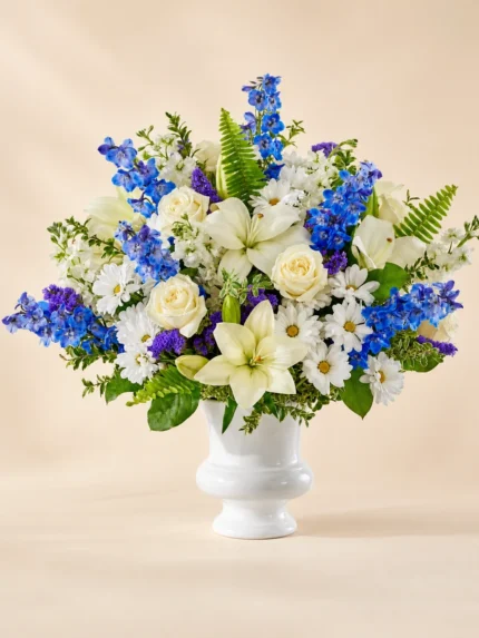 Serenity Tribute Arrangement with Daisies, Delphiniums, Lilies, Roses, and Stock